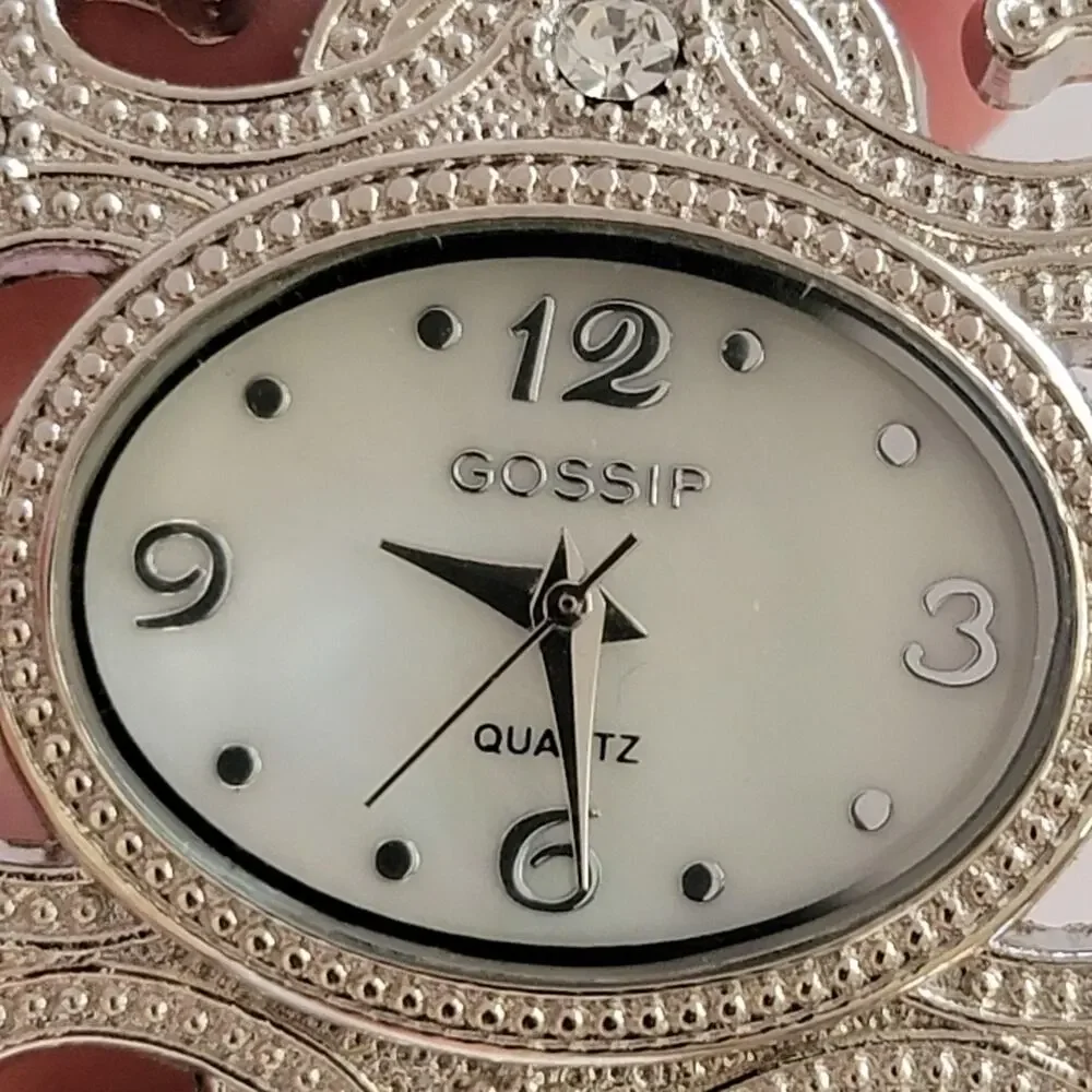 Gossip GSP5D3 Womens Watch Silver Case White Oval Dial Bangle Bracelet Quartz